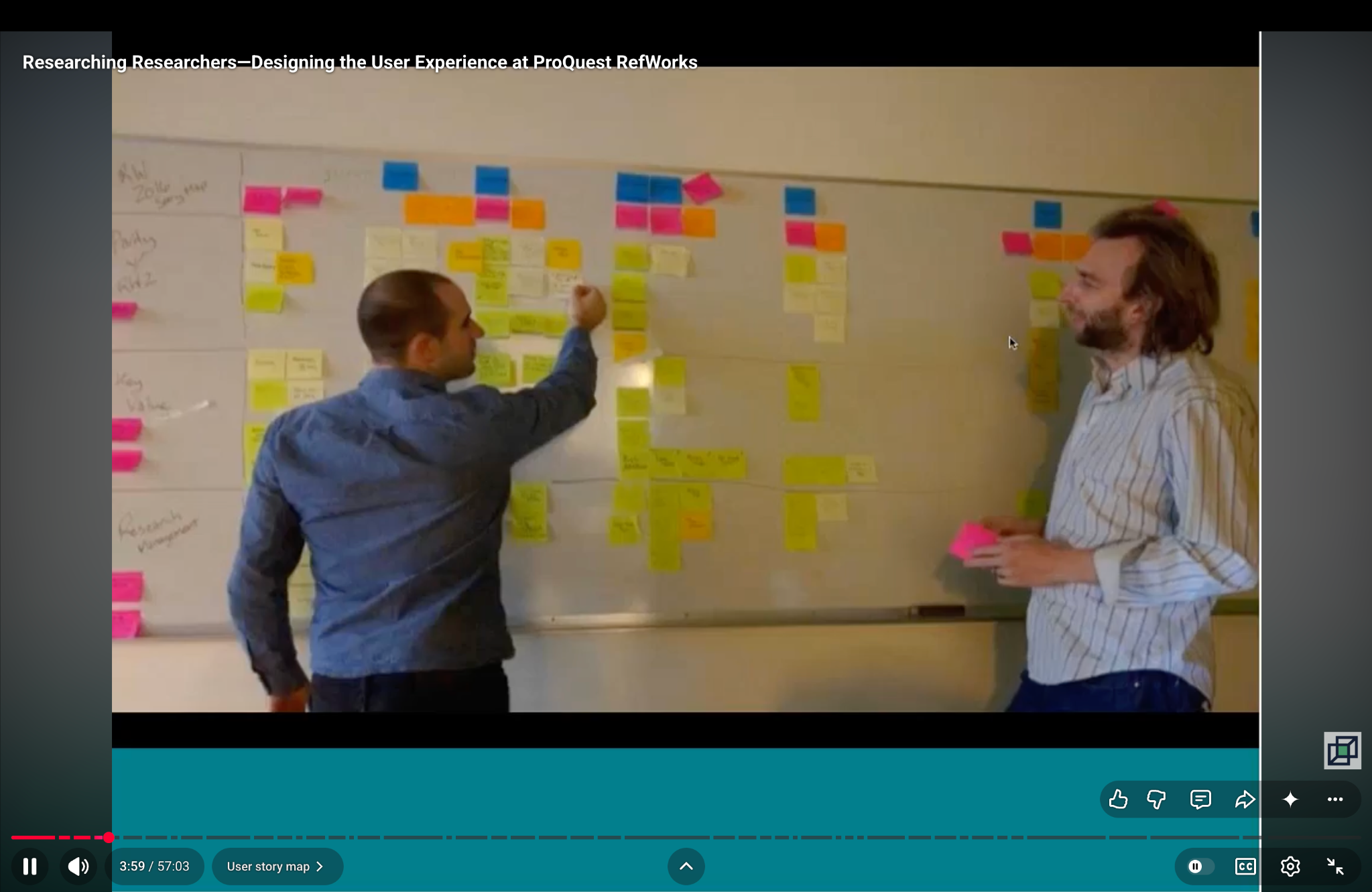 Mathias Burton collaborating with an engineering lead on a physical story map